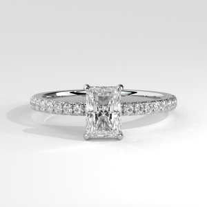 Radiant-cut engagement ring with slim pavé-set band and four-prong basket setting